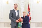 Iškilmių akimirka.