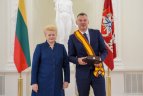 Iškilmių akimirka.