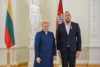 Iškilmių akimirka.