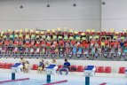 Į olimpiadą išvykstantiems plaukikams padovanotos olimpinės serijos monetos