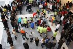 Prekybos ir laisvalaikio centre irkluotojai rungėsi ant treniruoklio.