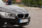 Olimpiečiai varžėsi automobilių slalomo trasoje