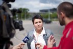Olimpiečiai varžėsi automobilių slalomo trasoje