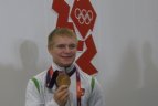 E. Petrauskui įteikta olimpinė bronza.